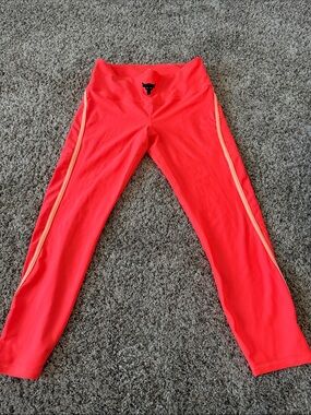 Under Armour Women's Bright Coral Leggings with Peach Side Stripes